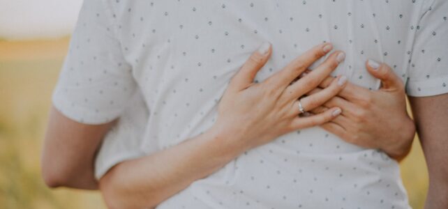 a person holding the hands together